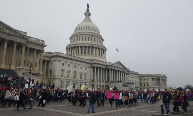 Canadian women march in Washington to protest President Trump
