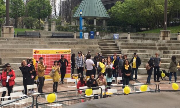 Yellow banners, balloons, mark endometriosis marches across Canada