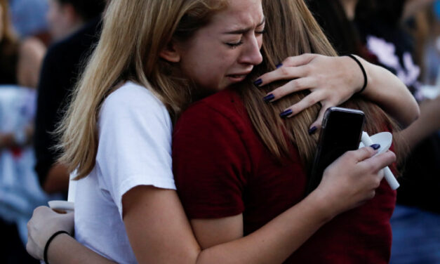 A candlelight vigil being held for 17 Florida school shooting victims