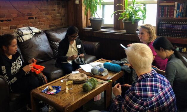Women knit together to help the homeless