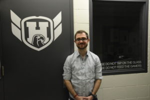 Geoffrey lachapelle in front of the esports training room.