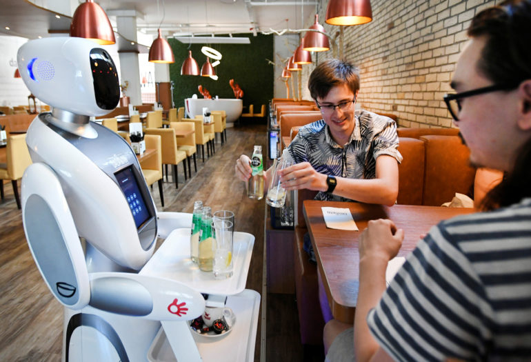 A robot server delivering drinks to customers at Dadawan restaurant in Maastricht, Netherlands (REUTERS/Piroschka Van De Wouw)