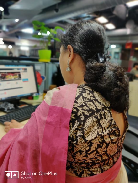 Charu Vij Majumdar working in newsroom in Cnn-news18, Network 18, New Delhi, India. (Charu Vij Majumdar)