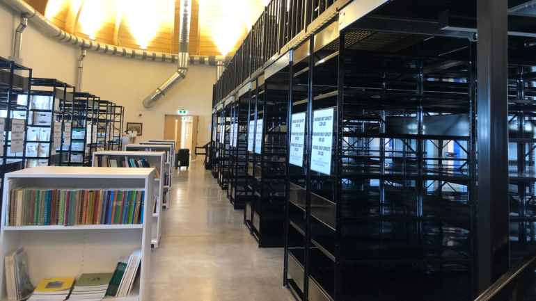 Inside The National Chiefs Library located within The Anishinaabek Discovery Centre. Some shelves remain bare as the library awaits archives.