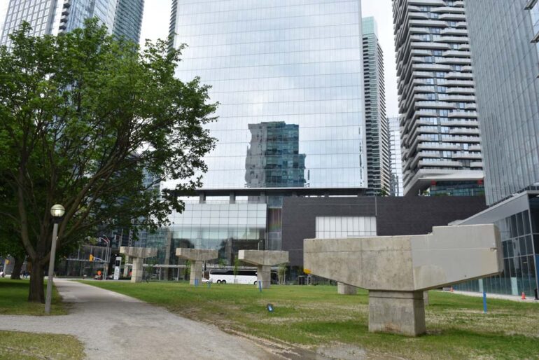 The old York-Bay-Yonge eastbound off-ramp of the Gardiner Expressway pillars remain at York Street Park, a reminder of what the area once was before.