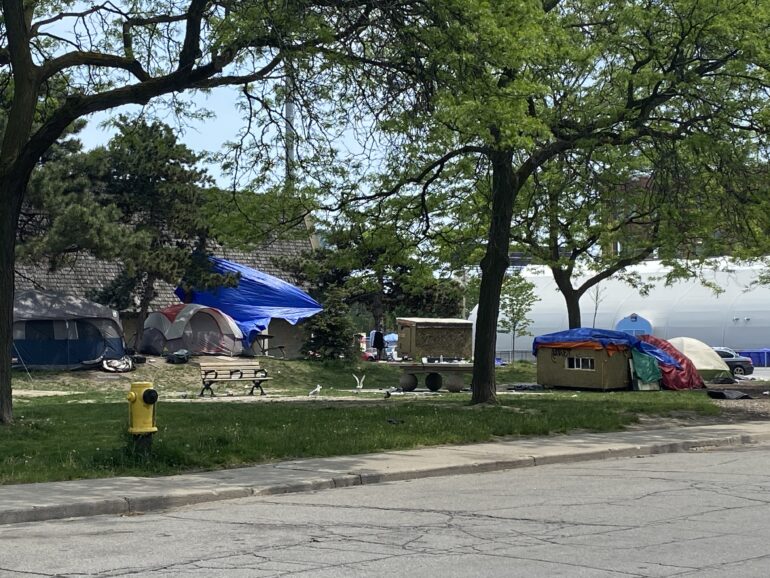 Remaining encampment next to a City of Toronto respite site at Lamport Stadium.