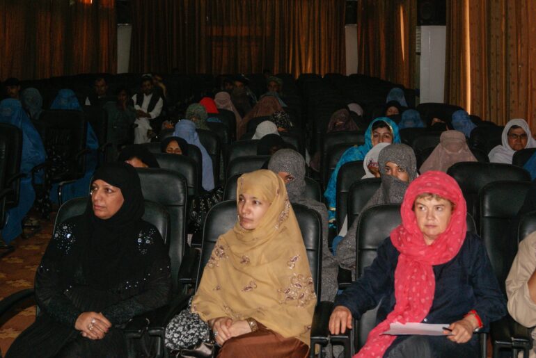 Women attend a public gathering at the Voter Registration Conference for the Municipal Advisory Board on June 3, 2013, in Helmand, Afghanistan.