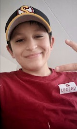 Carter Ortiz, 11, wearing his Scarborough Stingers hat, getting ready for an at-home workout on Jan. 26. COVID-19 continues to push in-person sports events online.