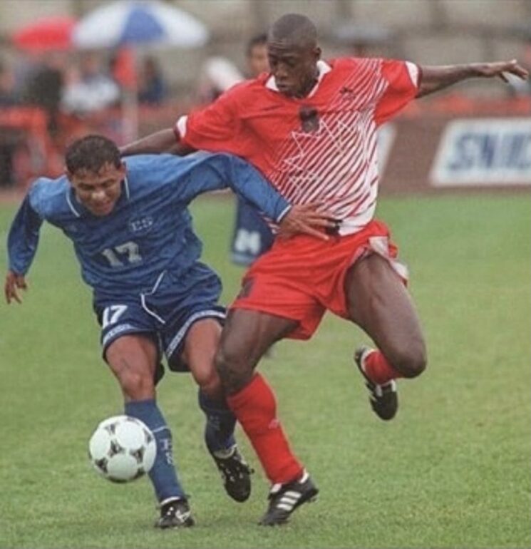 Alex Bunbury battling for the ball against El Salvador in 1997. Bunbury says that Canada's solid chemistry and confidence is the key to their current success.