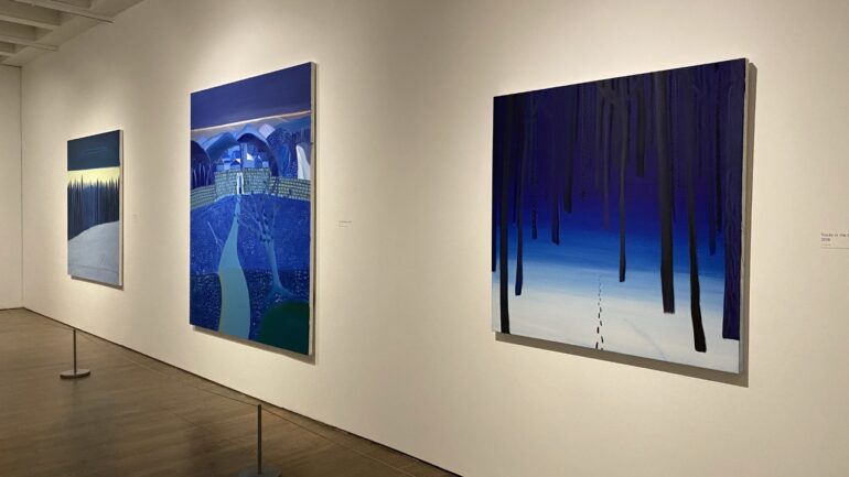 Three of Wong's paintings from his collection in the exhibit.