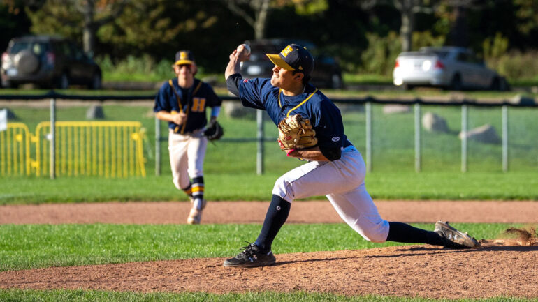 Humber Pitcher Eric Alcaraz pitching during 14-7 win over Centennial College.