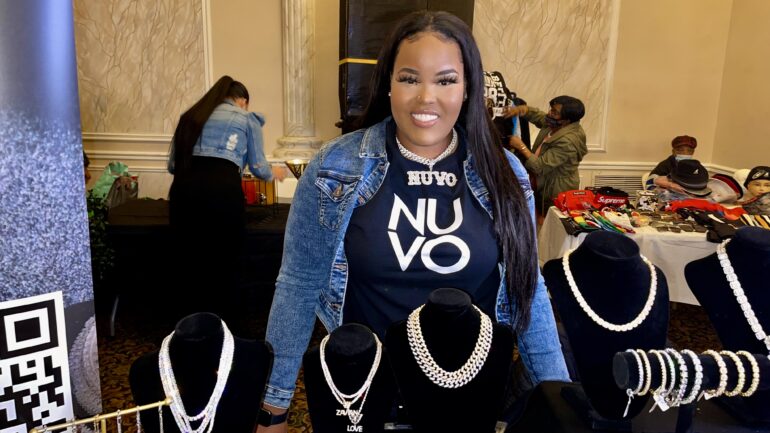 Humber student and owner of Nuvo accessories, Shaquilla Whittaker stand by her booth at Freedom Mas Band launch on Sunday March 20.