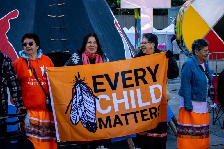 Every Child Matters flag outside of Toronto City Hall during Toronto Council Fire Legacy Gathreing