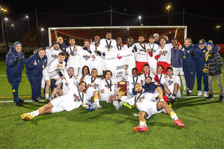 Humber Hawks men's soccer team posing after the win.