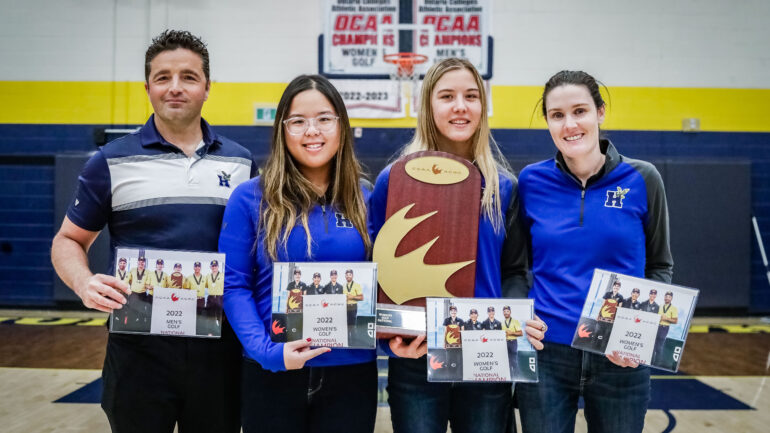 Humber men's golf team celebrates their national title on Champions Night at Humber North Campus on Jan. 21. Pictured left to right Nick Trichilo, Elaine Surjoprajogo, Madison Ouellette, Hayley McCallum.