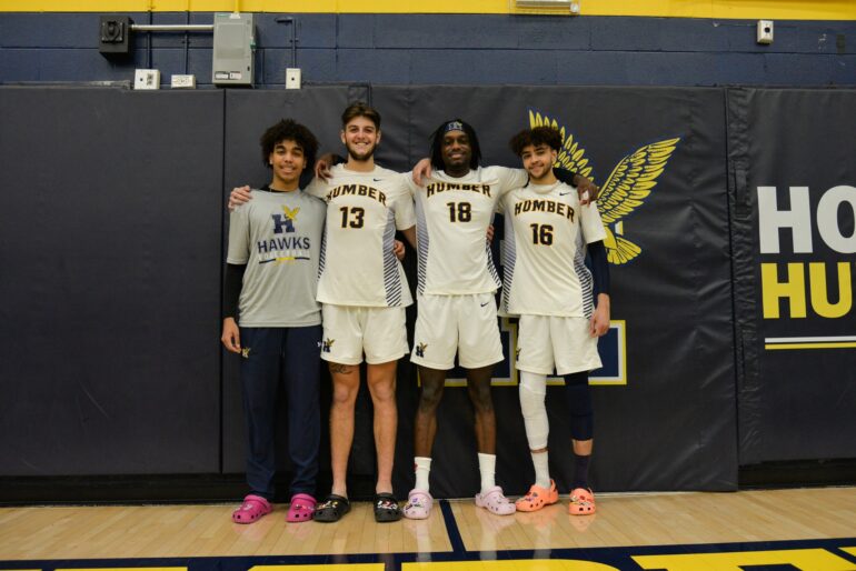 The Crocs Crew (Jayden Benjamin, Jake Gomes, Nazyr Francis, and Teyven Blackmore) wore Crocs on game day.