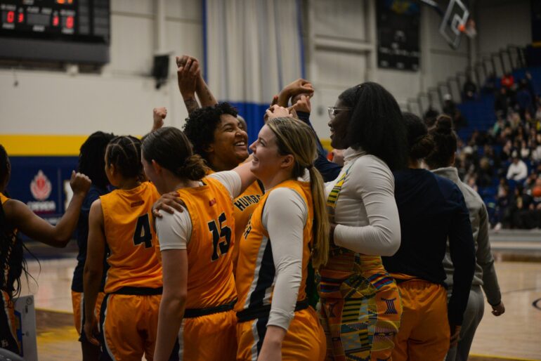 The players from Humber Hawks women's basketball cheered for one another before playing against Sheridan on Feb. 16, 2023.