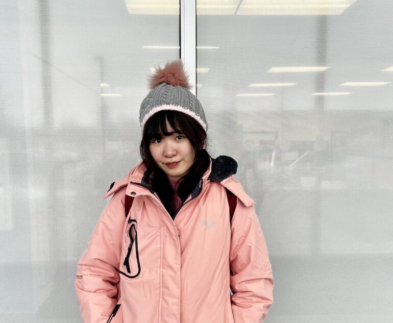 Irin Wasusatein, student at Humber College wearing pink jacket and shirt showing her support for Pink Shirt day