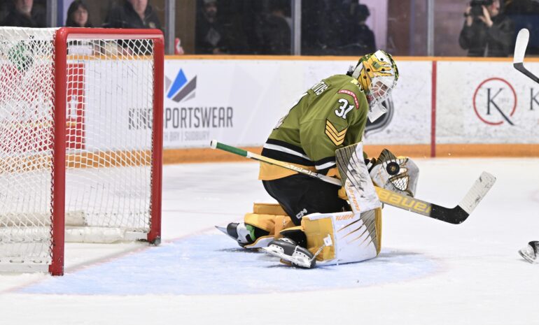 North Bay goaltender Dom DiVincentiis makes save to help evaluate his Batalion to a win over the Sudbury Wolves.