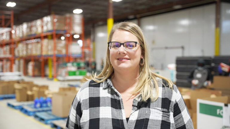 Meghan Nicholls, chief executive officer of the Mississauga Food Bank, stands in the organization's new location with double the space for supplies in their efforts to meet rising demands.