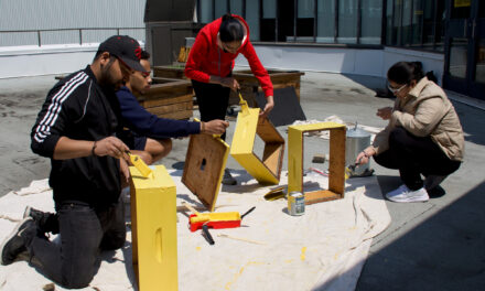 The bees are back! Students repaint beehives as honeybees return to campus