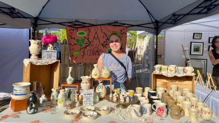 artist selling pottery