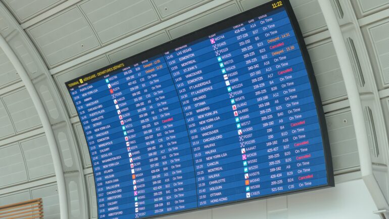 Arrival board at the Toronto Pearson Airport showing cancelled flights from WestJet, on May 19, 2023.