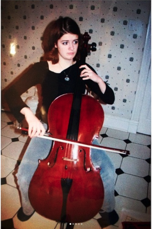 Fjóla Evans playing cello in the bathroom at her parents’ home in Toronto when she was a teenager.