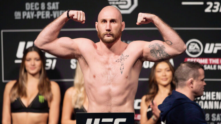 Canadian UFC fighter Kyle "The Monster" Nelson poses on the scale ahead of his bout against Diego Ferreira in UFC 231 in Toronto in 2018. Nelson is expected to fight at UFC 289 in Vancouver on June 10, 2023.