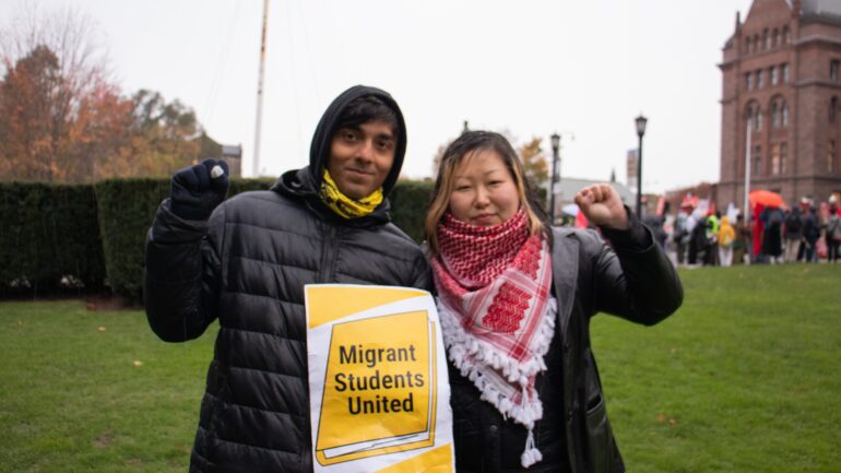 Left to right: Harshill Dhingra and Sarom Rho, both organizers for Migrant Workers Alliance for Change (MWAC).