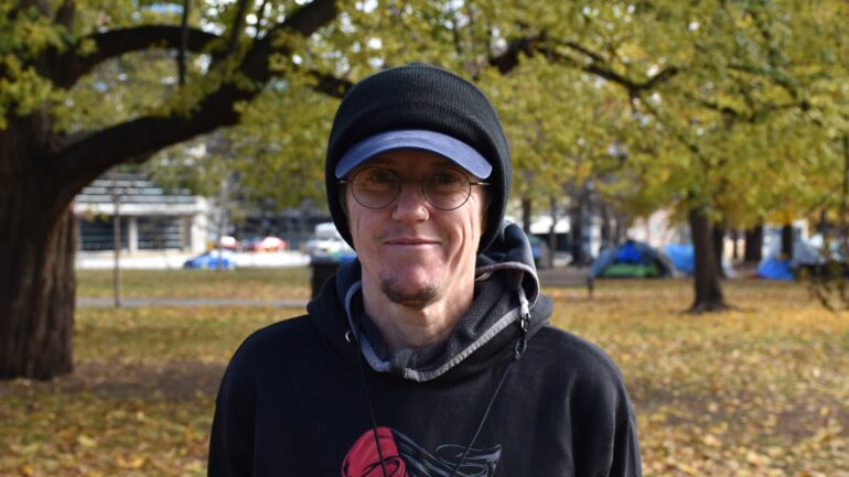 Toronto Food Not Bombs member A.W Peet after a Sunday of volunteering at Allen Gardens. The chapter has distributed free groceries and packaged food, with no registration or eligibility requirement, to local community members since 2016.