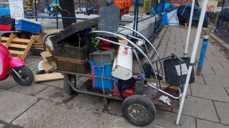 Personal belongings left behind after the Saint Stephen-in-the-Fields encampment eviction near Kensington Market.