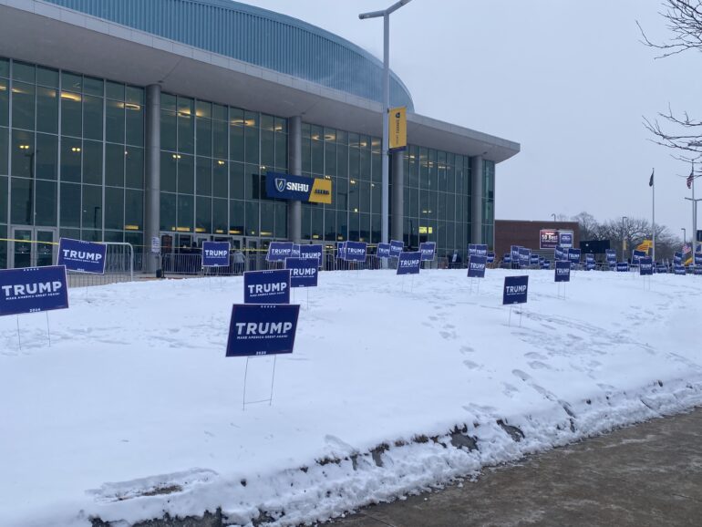 Banners in support of Donald Trump in front of the SNHU Arena of Manchester, N.H., where Trump hold a rally on Jan. 20.
