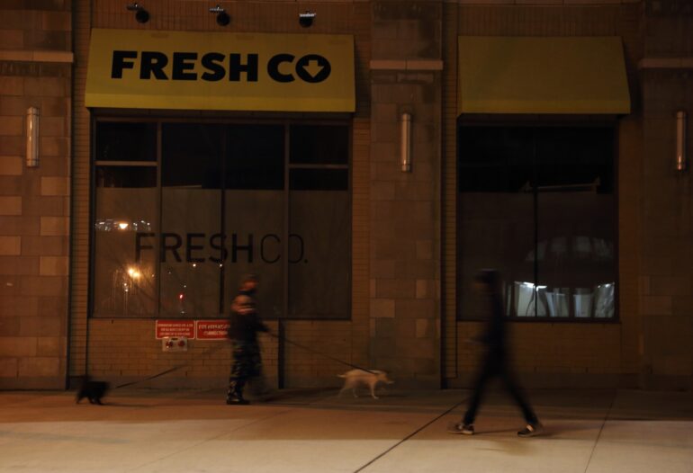 Grocery shops had to shut down due to power outage. 
Photograph of a closed FreshCo grocery store at Sherbourne and Isabella.