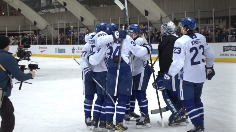 Maple Leafs celebrating team win during outdoor practice at Nathan Phillips Square on Feb, 8.