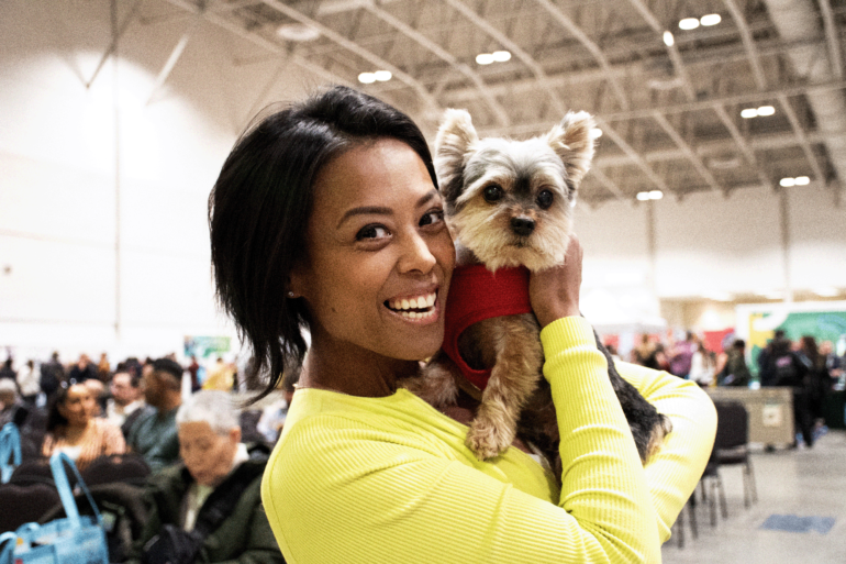 Theresa Corazon poses with Love, a 12-year-old teacup yorkie, at the Planted Expo on March 23.