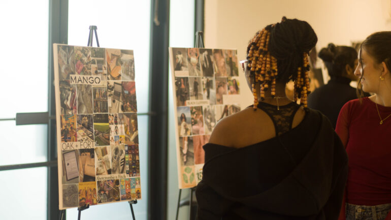 Fashion management students look over each others mood boards.
Picture Credit: Niharika Nayak