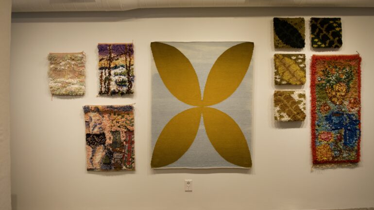A photo of the textile-based art exhibit at Craft Ontario.