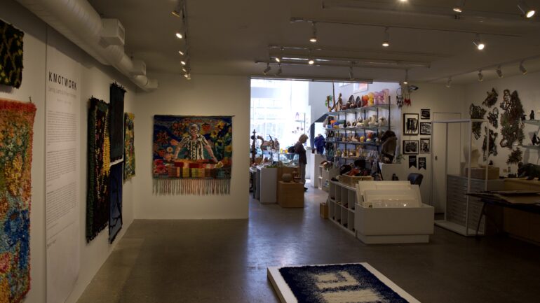 A photo of the textile-based art exhibit at Craft Ontario.