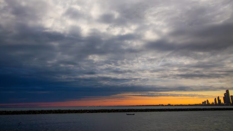 Sunset-like colours were visible from the Toronto waterfront moments before the peak of the eclipse.