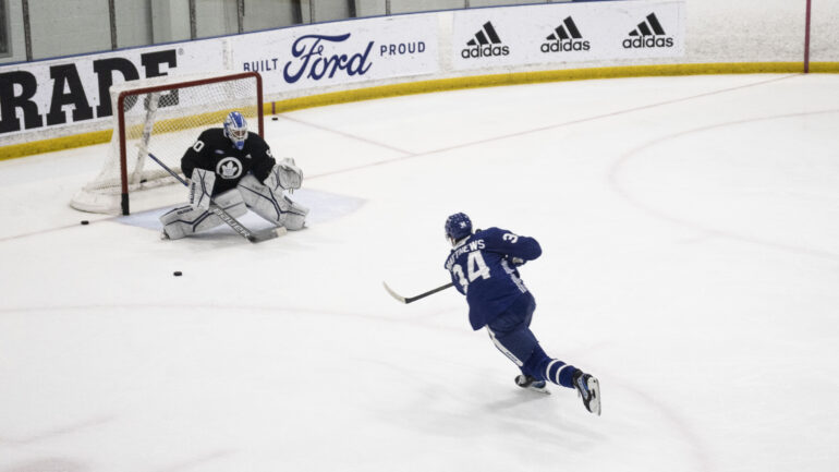 Leafs Centre Auston Matthews taking a shot at his goaltender, Joseph Woll. This photo is from the Leafs first practice of the season in September, 2023.