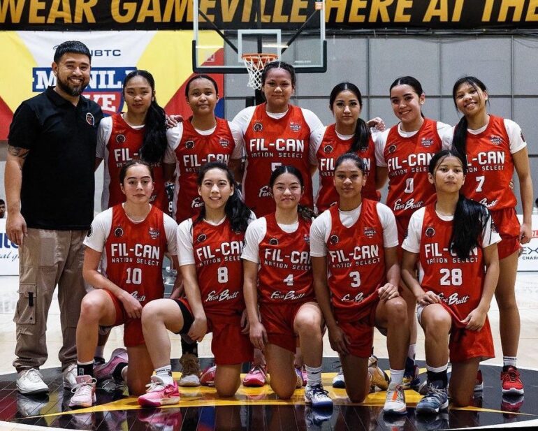 Manglal-lan, second on the right in the first row, with her teammates in the NBTC Tournament.