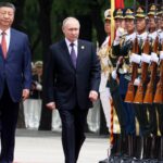 Putin travels to Beijing for first state visit after inauguration