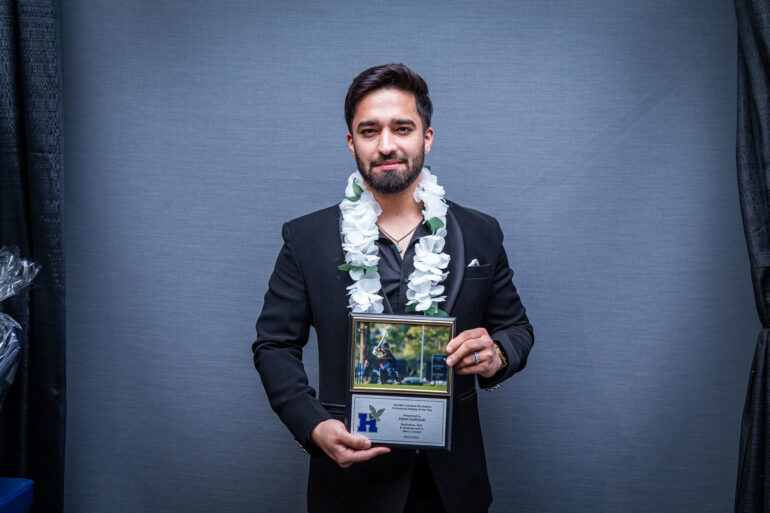 Cricketer Aman Gurnani with his Extramural Athlete of the Year award.