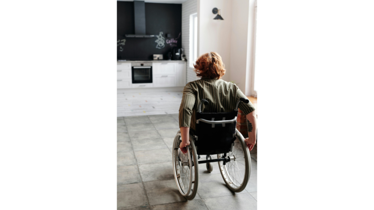 A woman on a wheelchair.